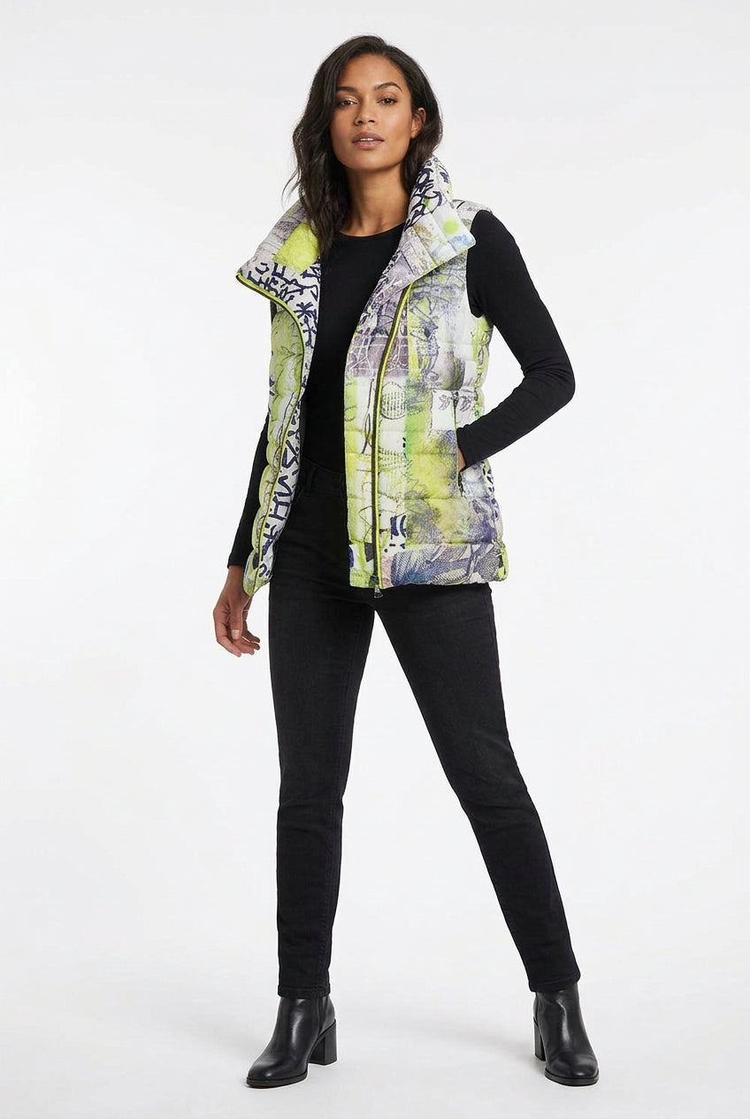 A sleeveless puffer vest with a high collar, featuring an abstract graffiti-style print in neon yellow-green, navy blue, white, and gray, with a yellow zipper.